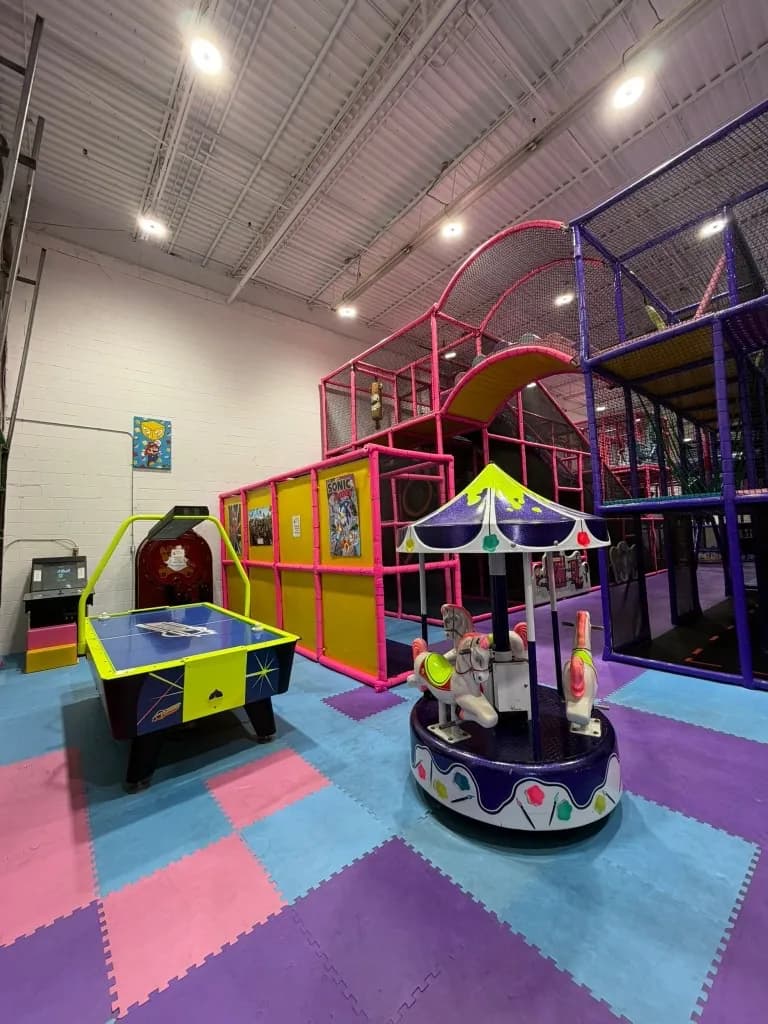 Climbing web walkway with colorful steps at Fun Factory