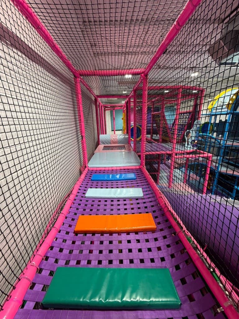 Colorful crawl-through play tunnel at Fun Factory