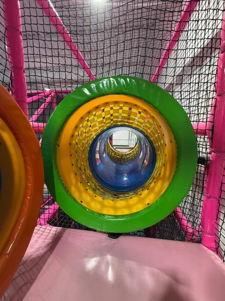 Blue slides and padded play structure inside Fun Factory Pickering