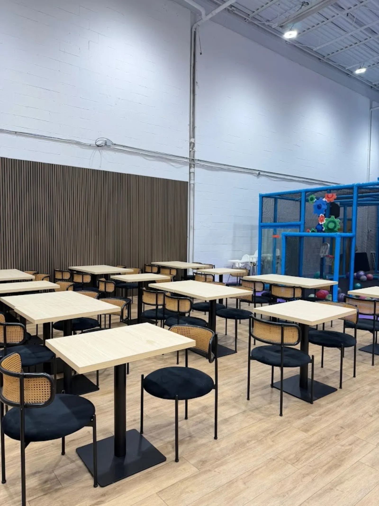 Parent seating area with view of the play structure at Fun Factory