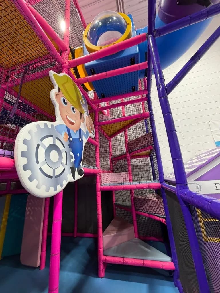 Roller obstacles on an elevated play bridge at Fun Factory