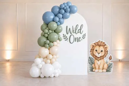 Single backdrop with balloon garland, vinyl, and themed cutout