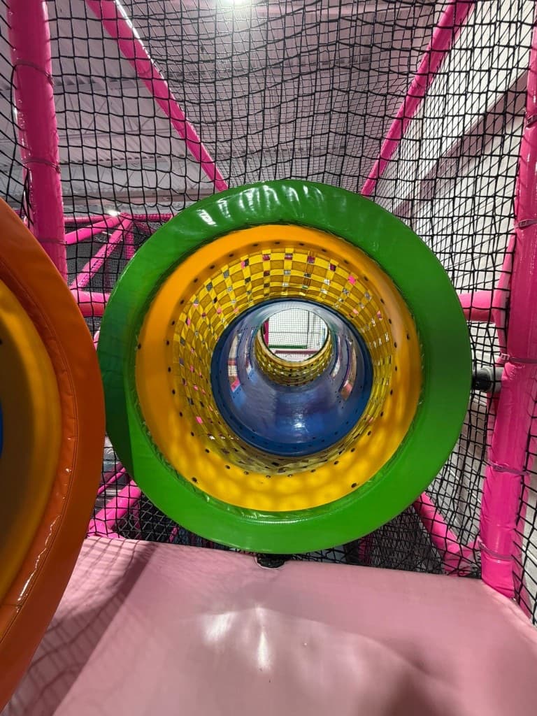 Blue slides and padded play structure inside Fun Factory Pickering