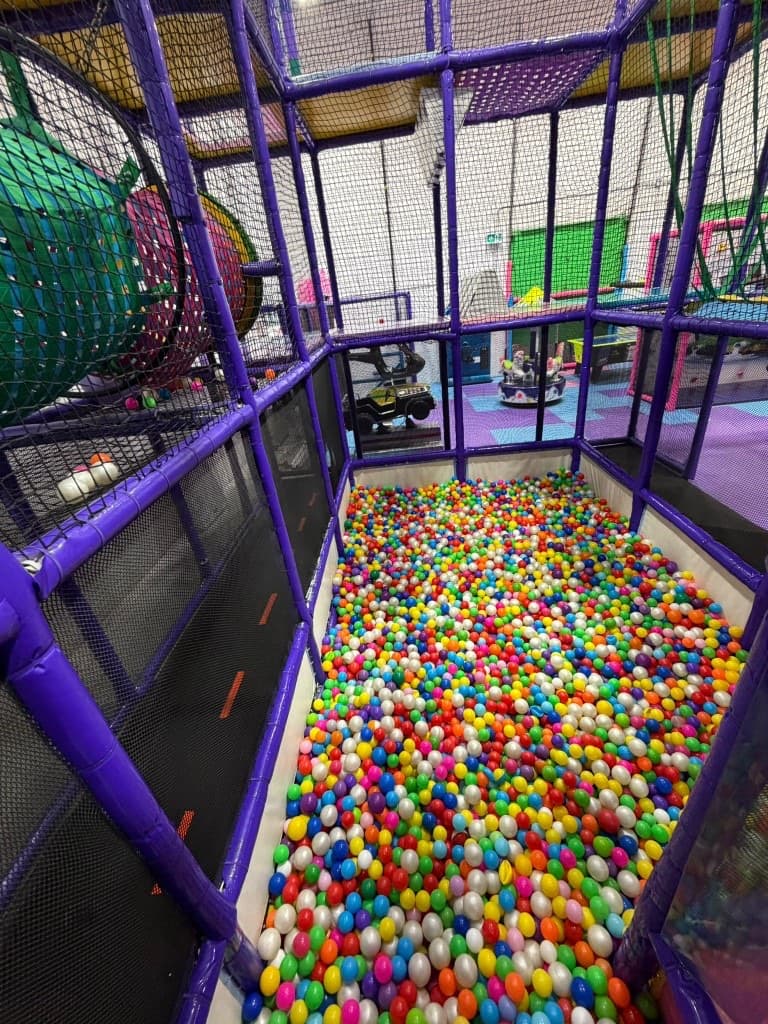Indoor sports court with basketball hoop at Fun Factory Play Café